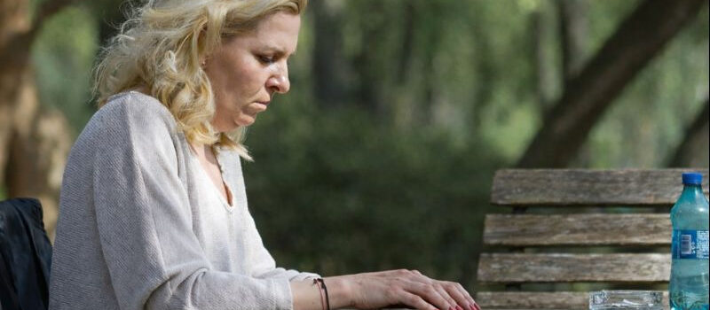 Woman at picnic table
